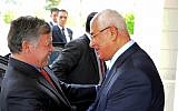 In this image released by the Egyptian presidency, Egyptian President Adly Mansour, right, greets Jordan's King Abdullah II on his arrival to the presidential palace, Saturday, July 20, 2013 (photo credit: AP)