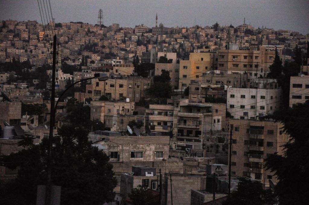 Orange-hued buildings before sundown (photo credit: Michal Shmulovich/Times of Israel)