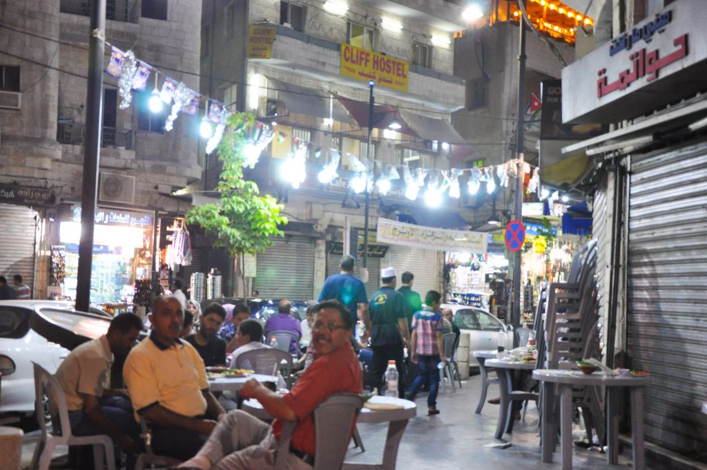 The breaking of the fast at Hashem's, Amman's most famous hummus eatery (photo credit: Michal Shmulovich/Times of Israel)