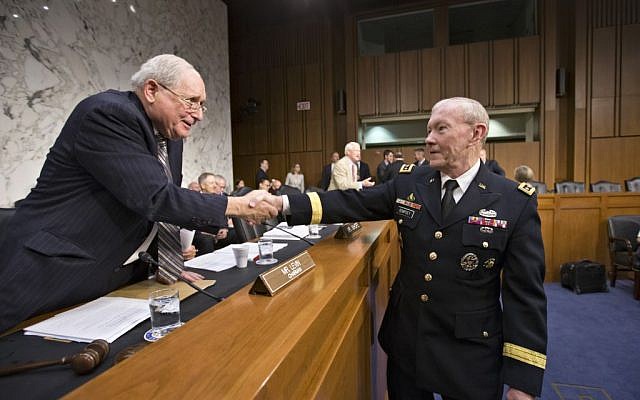 Gen. Martin Dempsey, chairman of the Joint Chiefs of Staff, right, greets Senate Armed Services Committee Chairman Carl Levin, D-Mich., left, as he appears before the committee for a hearing to consider his reappointment to the military's highest post, on Capitol Hill in Washington, Thursday, July 18, 2013 (photo credit: AP/J. Scott Applewhite) Gen. Martin Dempsey, chairman of the Joint Chiefs of Staff, right, greets Senate Armed Services Committee Chairman Carl Levin, D-Mich., left, as he appears before the committee for a hearing to consider his reappointment to the military's highest post, on Capitol Hill in Washington, Thursday, July 18, 2013 (photo credit: AP/J. Scott Applewhite)