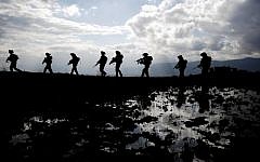 Golani Brigade soldiers, on the Golan Heights (photo credit: Abir Sultan/Flash90/File)