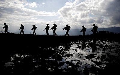Golani Brigade soldiers, on the Golan Heights (photo credit: Abir Sultan/Flash90/File)