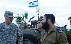 A US Army officer speaks with IDF troops during a joint exercise in Tel Aviv, in 2012 (photo credit: Yossi Zeliger/Flash90)