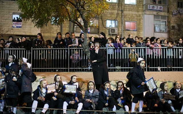 File: Ultra Orthodox Jews belonging to the Satmar Hasidic group headed by Satmar Admor of Williamsburg, Rabbi Zalman Leib Teitelbaum, wait for his arrival in the Ultra Orthodox Jewish neighborhood of Mea Shearim in Jerusalem on January 20, 2013. Photo by Yonatan Sindel/Flash90