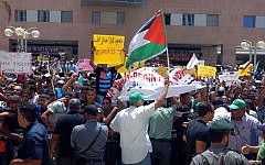 Israeli Bedouin protest against the state's impending confiscation of lands, in the southern Israeli city of Beersheba, in the Negev, June 13, 2013 (photo credit: Dudu Greenspan/Flash90)