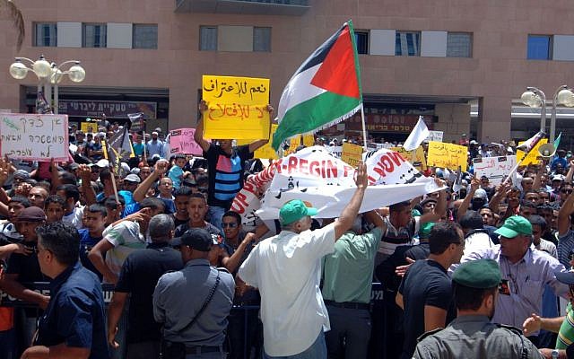 Israeli Bedouin protest against the state's impending confiscation of lands, in the southern Israeli city of Beersheba, in the Negev, June 13, 2013 (photo credit: Dudu Greenspan/Flash90) Israeli Bedouin protest against the state's impending confiscation of lands, in the southern Israeli city of Beersheba, in the Negev, June 13, 2013 (photo credit: Dudu Greenspan/Flash90)