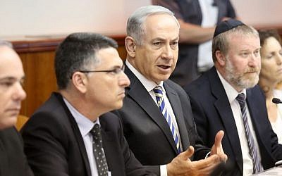 Prime Minister Benjamin Netanyahu attends a weekly cabinet meeting, June 2013 (photo credit: Marc Israel Sellem/Pool/Flash90)