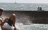 Hanging out by the spray of beach water in Tel Aviv (photo credit: Chen Leopold/Times of Israel)