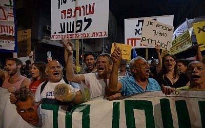 Protesters in Tel Aviv Saturday night. (photo credit: Gili Yaari/ Flash90)
