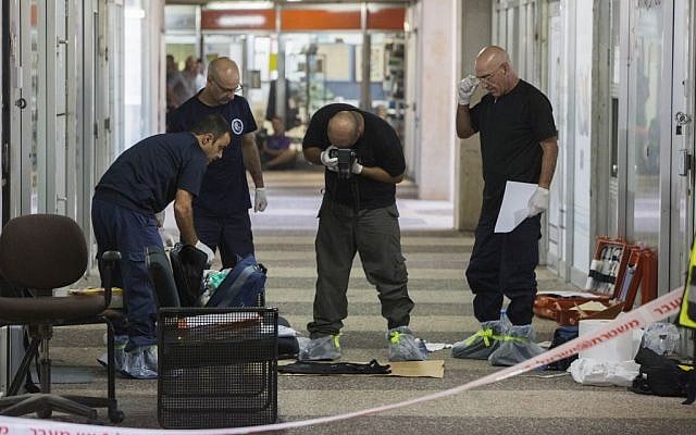 Police at the scene of the shooting Tuesday. (photo credit: Yonatan Sindel/Flash90)