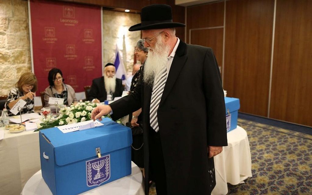 A rabbi casts his vote for the elections of the new chief rabbis of Israel, in Jerusalem on July 24, 2013. (photo credit: Yonatan Sindel/Flash90) A rabbi casts his vote for the elections of the new chief rabbis of Israel, in Jerusalem on July 24, 2013. (photo credit: Yonatan Sindel/Flash90)
