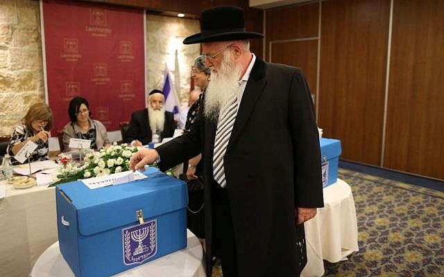 A rabbi casts his vote for the elections of the new chief rabbis of Israel, in Jerusalem on July 24, 2013. (photo credit: Yonatan Sindel/Flash90) A rabbi casts his vote for the elections of the new chief rabbis of Israel, in Jerusalem on July 24, 2013. (photo credit: Yonatan Sindel/Flash90)