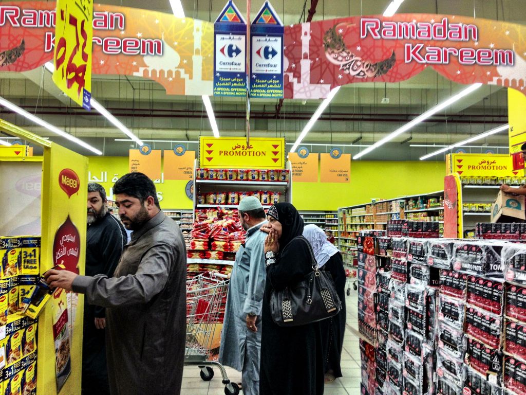 A busy supermarket in West Amman. Food stores are open all day, providing people with a chance to stock up for their evening Iftar meals. (photo credit: Michal Shmulovich/Times of Israel)