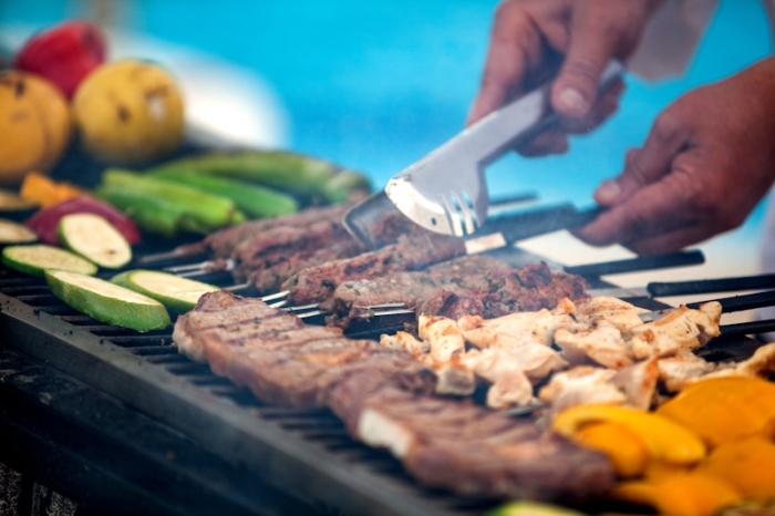 Getting the meat grilled at the Inbal terrace bar (Courtesy Inbal Hotel) Getting the meat grilled at the Inbal terrace bar (Courtesy Inbal Hotel)