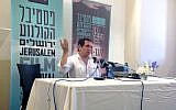 Mohsen Makhmalbaf talking about Iran, freedom and Israel's similarities to his native country at a Jerusalem press conference. (photo credit: Leeor Bronis/Times of Israel)