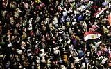 Opponents of Egypt's Islamist President Mohammed Morsi protest near the presidential palace, in Cairo, Egypt, Sunday, June 30, 2013. (photo credit: AP/Hassan Ammar)
