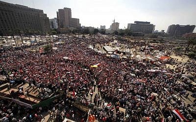 Opponents of Egypt's Islamist president Mohammed Morsi at a protest in Tahrir Square in Cairo, Egypt, on Wednesday. (photo credit: AP/Amr Nabil)