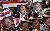 Supporters of the ousted President Mohammed Morsi demonstrate in Nasr City, a suburb of Cairo, Egypt, on Monday, July 8, 2013. (photo credit/Nasser Shiyoukhi/AP)