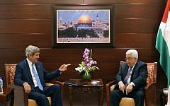 US Secretary of State John Kerry, center left, meets with Palestinian President Mahmoud Abbas on Friday, July 19, 2013 in the West Bank city of Ramallah (photo credit: AP/Mandel Ngan, Pool)
