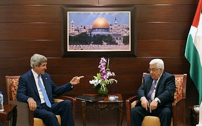 US Secretary of State John Kerry, center left, meets with Palestinian President Mahmoud Abbas on Friday, July 19, 2013 in the West Bank city of Ramallah (photo credit: AP/Mandel Ngan, Pool)