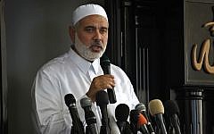 Gaza's Hamas Prime Minister Ismail Haniyeh gives a speech during Friday prayers in the Bureij refugee camp, central Gaza Strip, on July 5, 2013. (photo credit: AP/Adel Hana)