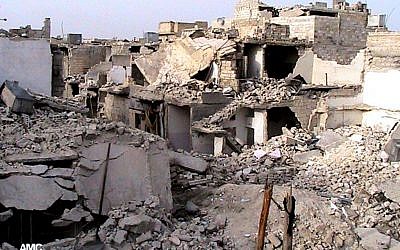 Homes destroyed by Syrian government airstrikes and shelling in Aleppo, Syria, Tuesday, July 2, 2013 (photo credit: AP/Aleppo Media Center AMC)