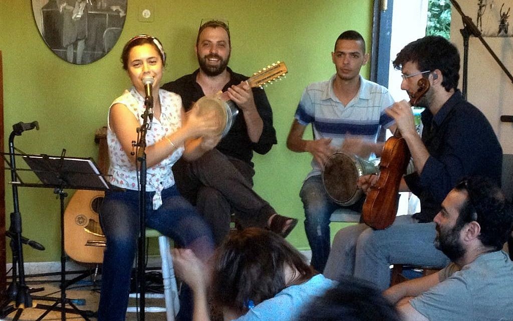 Neta and Amit play a concert with their band at their home in Katamon, for the Jerusalem Season of Culture (photo credit: Leeor Bronis/Times of Israel) Neta and Amit play a concert with their band at their home in Katamon, for the Jerusalem Season of Culture (photo credit: Leeor Bronis/Times of Israel)