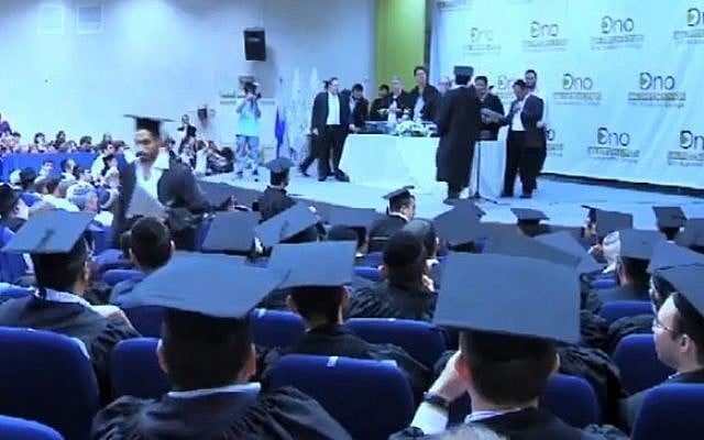 Ultra-Orthodox students attend a graduation ceremony at the Ono Academy's Jerusalem branch (image capture: YouTube) Ultra-Orthodox students attend a graduation ceremony at the Ono Academy's Jerusalem branch (image capture: YouTube)