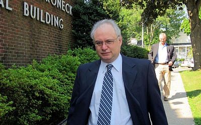 Rabbi Alfredo Borodowski arrives for an appearance in Mamaroneck Village Court in Mamaroneck, NY on Thursday, July 18, 2013. (photo credit: AP Photo/Jim Fitzgerald)