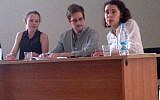 NSA leaker Edward Snowden, center, attends a news conference at Moscow's Sheremetyevo Airport with Sarah Harrison of WikiLeaks, left, Friday, July 12 (photo credit: AP/Human Rights Watch, Tanya Lokshina)