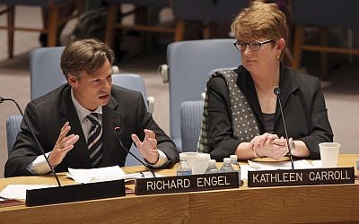 NBC News chief foreign correspondent Richard Engel, left, addresses a United Nations Security Council meeting on the protection of civilians in armed conflict and the protection of journalists, Wednesday, July 17, 2013 at U.N. headquarters. Karhleen Carroll, Associated Press executive editor and vice chair of the board of the Committee to Protect Journalists, listens at right. (photo credit: AP/Mary Altaffer)