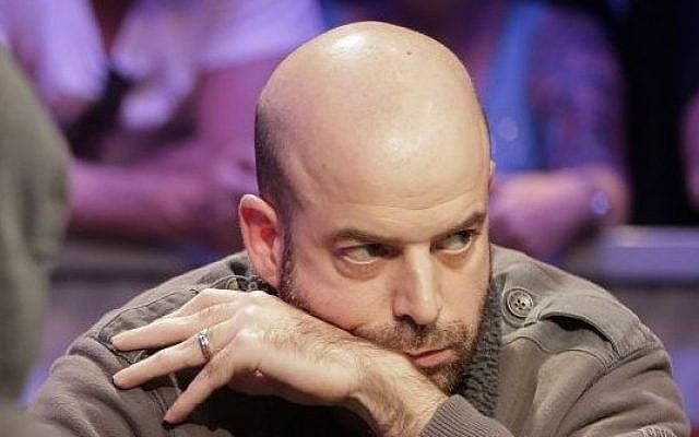 Amir Lehavot checks an opposing player during a hand of Texas Hold'em at the World Series of Poker, Las Vegas. (photo credit: AP/Julie Jacobson) Amir Lehavot checks an opposing player during a hand of Texas Hold'em at the World Series of Poker, Las Vegas. (photo credit: AP/Julie Jacobson)