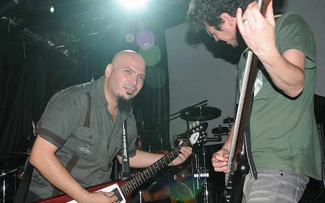 Abed Hathut, left, rocks out with Khalas. (photo credit: Sulafa Zidani)