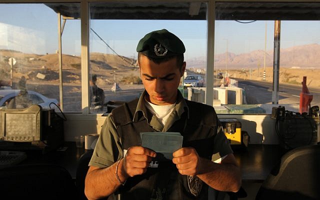 A border policeman checks the id of an individual at the Egyptian border (photo credit: Nati Shohat/Flash90) A border policeman checks the id of an individual at the Egyptian border (photo credit: Nati Shohat/Flash90)
