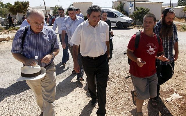 Zeev Elkin visits the settlement outpost of Migron in August 2012 (Photo credit: Lior Mizrahi/FLASH90)