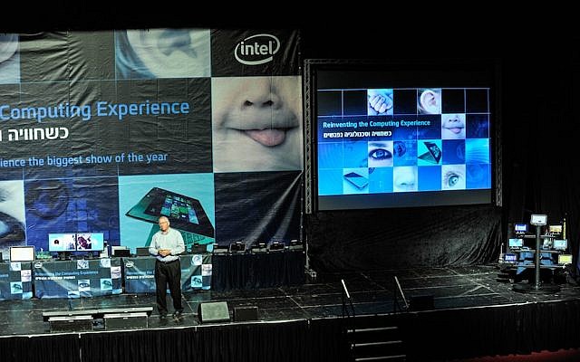 Yoav Hochberg on stage, surrounded by the dozens of new Intel devices presented at the event (Photo credit: Courtesy) Yoav Hochberg on stage, surrounded by the dozens of new Intel devices presented at the event (Photo credit: Courtesy)
