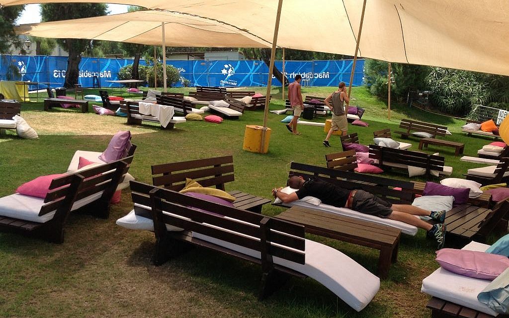 Chilling out at the Hub, the Maccabiah 2013 space for junior athletes (photo credit: Sam Whitefield/Times of Israel) Chilling out at the Hub, the Maccabiah 2013 space for junior athletes (photo credit: Sam Whitefield/Times of Israel)