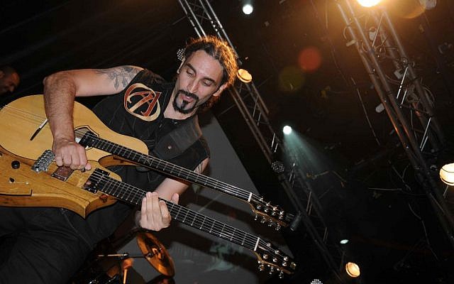 Kobi Farhi on stage with Orphaned Land (photo credit: Asher Kravitz)