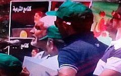 Sheikh Raed Salah (left, in white) speaks at Saturday's pro-Morsi demonstration in Kafr Kanna (photo credit: Channel 2 screenshot)