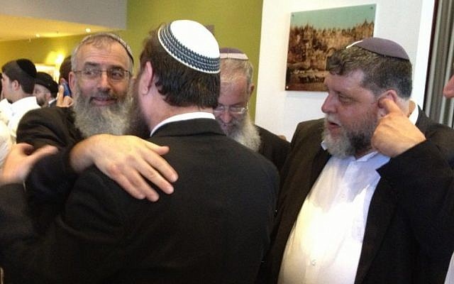 Rabbi David Stav greeting supporters before the polls closed (photo credit: Raphael Ahren)