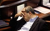 MK Ahmad Tibi seen during a Knesset plenum debate on a reform that would increase the electoral threshold, July 31, 2013. (photo credit: Flash90)