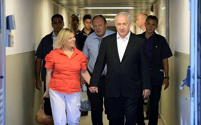 Benjamin Netanyahu (right) and his wife leave the Hadassah hospital, Sunday (photo credit: PMO/via Faceboook) Benjamin Netanyahu (right) and his wife leave the Hadassah hospital, Sunday (photo credit: PMO/via Faceboook)