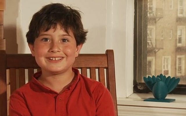 Manhattan fourth-grader Asher Weintraub alongside his Menurkey prototype. (photo credit: Kickstarter screenshot) Manhattan fourth-grader Asher Weintraub alongside his Menurkey prototype. (photo credit: Kickstarter screenshot)
