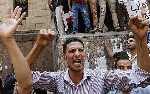 Supporters of ousted Egyptian president Mohammed Morsi take to the streets on Friday (photo credit: AJELive via Twitter)