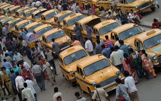 Taxis lined up outside the Calcutta main train station in India (Deborah Sinai/Flash90)