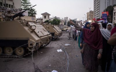 Supporters of deposed Egyptian president Mohammed Morsi scream chants at Egyptian soldiers during a protest in Cairo on August 12. (photo credit: Ed Giles/Getty via JTA)