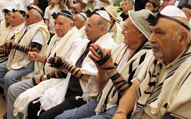 Holocaust survivors celebrate their belated Bar Mitzvah at the Western Wall in Jerusalem's Old City in October 2012, having been unable to mark the event at the traditional age of 13 (photo credit: Yoav Ari Dudkevitch/Flash90) Holocaust survivors celebrate their belated Bar Mitzvah at the Western Wall in Jerusalem's Old City in October 2012, having been unable to mark the event at the traditional age of 13 (photo credit: Yoav Ari Dudkevitch/Flash90)