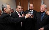 Gilad Erdan, in a pink tie, upon taking office. Far right is the outgoing minister, Avi Dichter, along with Defense Minister Moshe Ya'alon, blue tie, and Ehud Barak (photo credit: Defense Ministry/Flash 90)