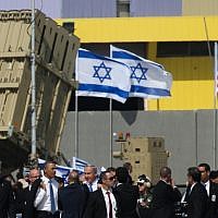 Then-US president Barack Obama and Prime Minister Benjamin Netanyahu alongside an Iron Dome missile defense battery during Obama's visit to Israel in March 2013. (Nati Shohat/Flash90)