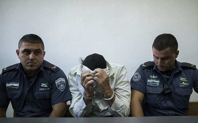 An ultra-Orthodox Jewish man of the anti-Zionist Neturei Karta group, who was charged trying to spy for Iran, seen at the Jerusalem District Court in Jerusalem, August 5, 2013. (photo credit: Yonatan Sindel/Flash90) An ultra-Orthodox Jewish man of the anti-Zionist Neturei Karta group, who was charged trying to spy for Iran, seen at the Jerusalem District Court in Jerusalem, August 5, 2013. (photo credit: Yonatan Sindel/Flash90)